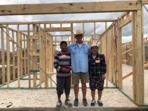 troy jessee at house build with a family
